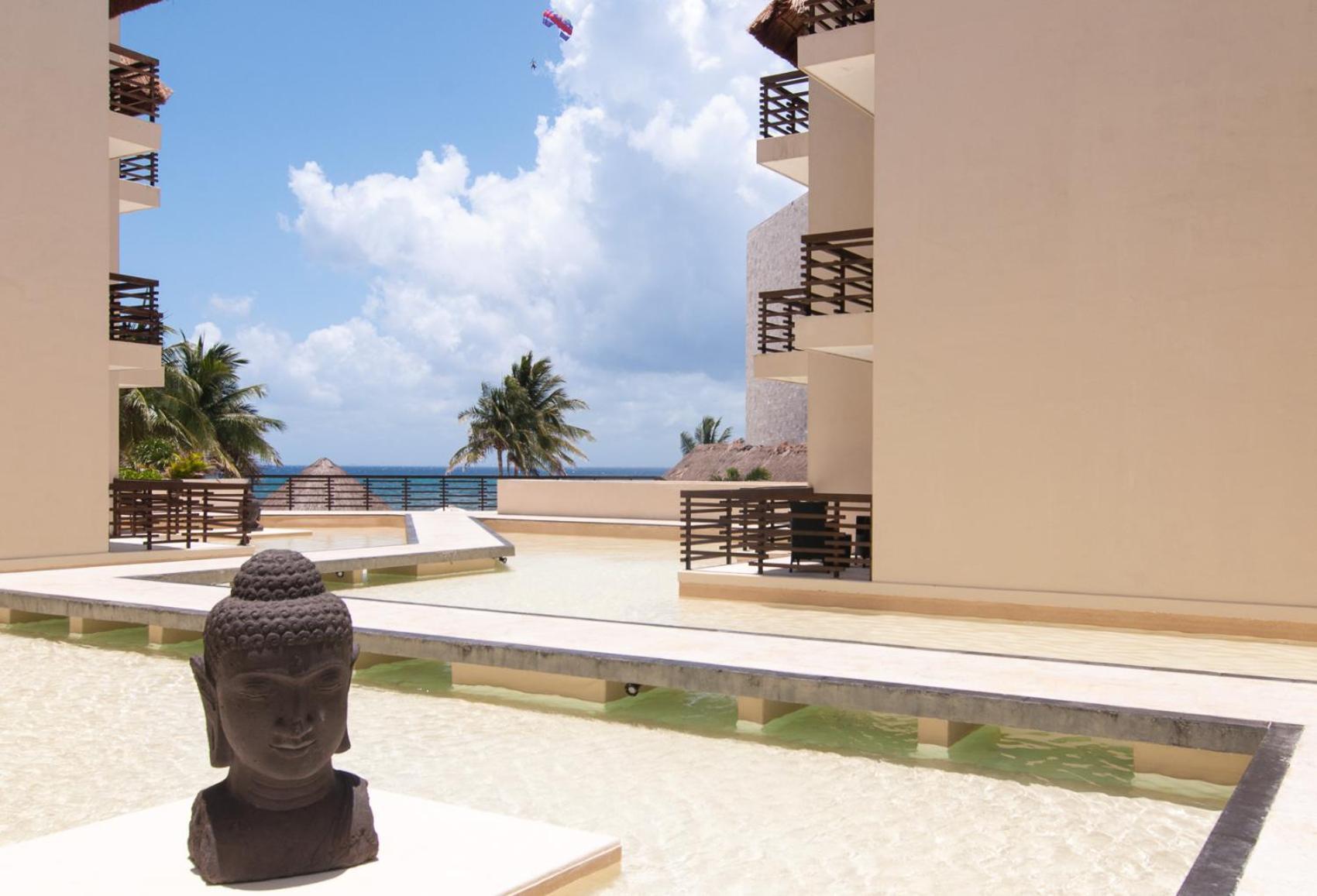 Aldea Thai Tropical Oasis Steps To The *